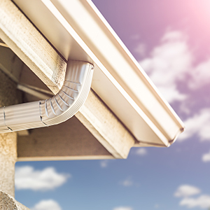 Chandler's Roofing Gutter Services - Off white k-style seamless gutter system