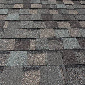 Chandlers Roofing Asphalt Roofing - Close up of mult-gray colored roofing shingles