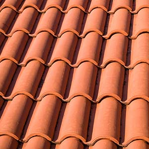 Chandlers Roofing Tile Roofing - Close up of red spanish tile shingles