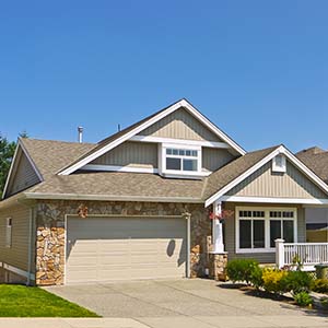 Chandlers Roofing Roofing - house with asphalt gray shingled roof